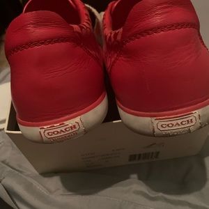These are preowned coach red sneakers